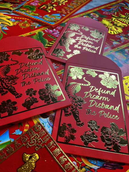 "Defund, Disarm, Disband the Police" red envelopes